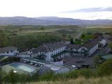View from a hilltop looking down on Chico Hot Springs