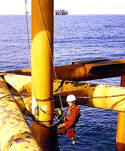 Inspector on offshore oil drilling rig