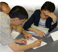A small group working on a document