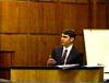 Greg presenting direct testimony