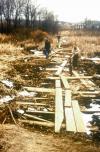 Boardwalk extending west of well H into the wetland built by the U.S. Geological Survey to access observation wells